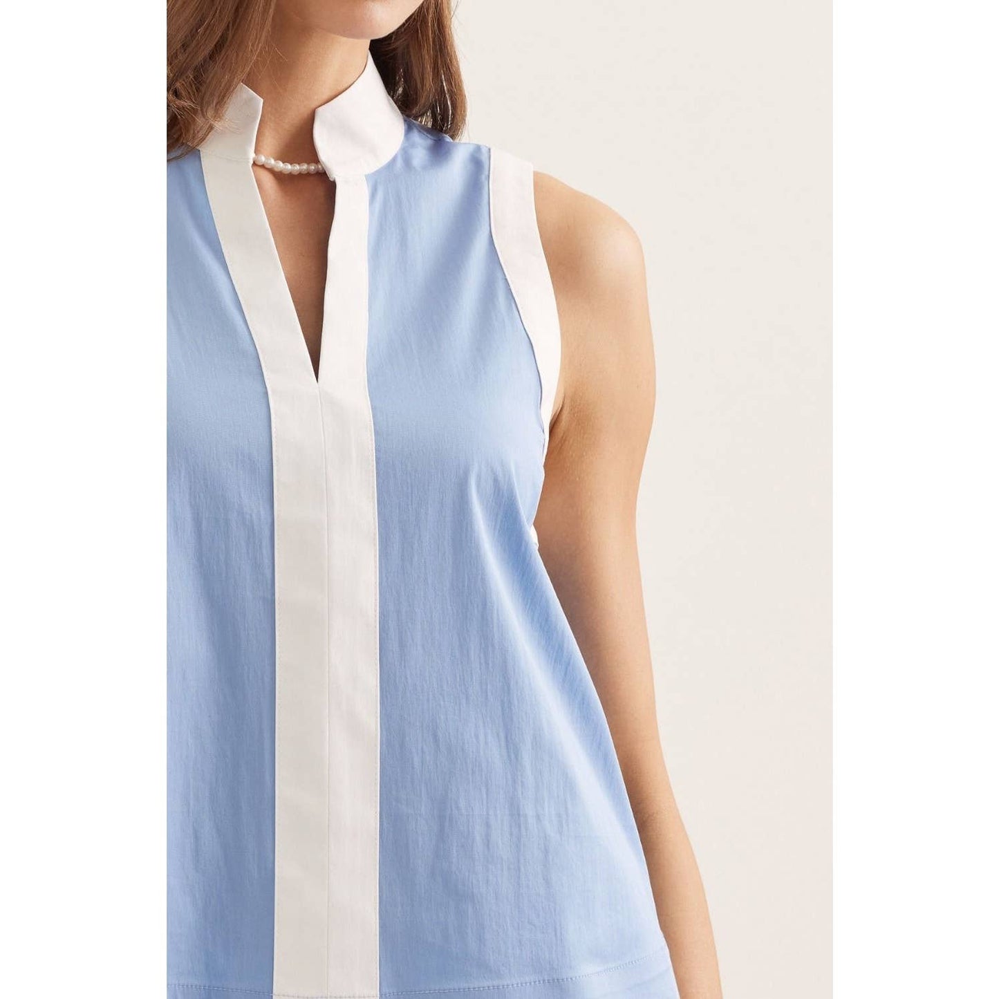 Solid sleeveless top: BLACK