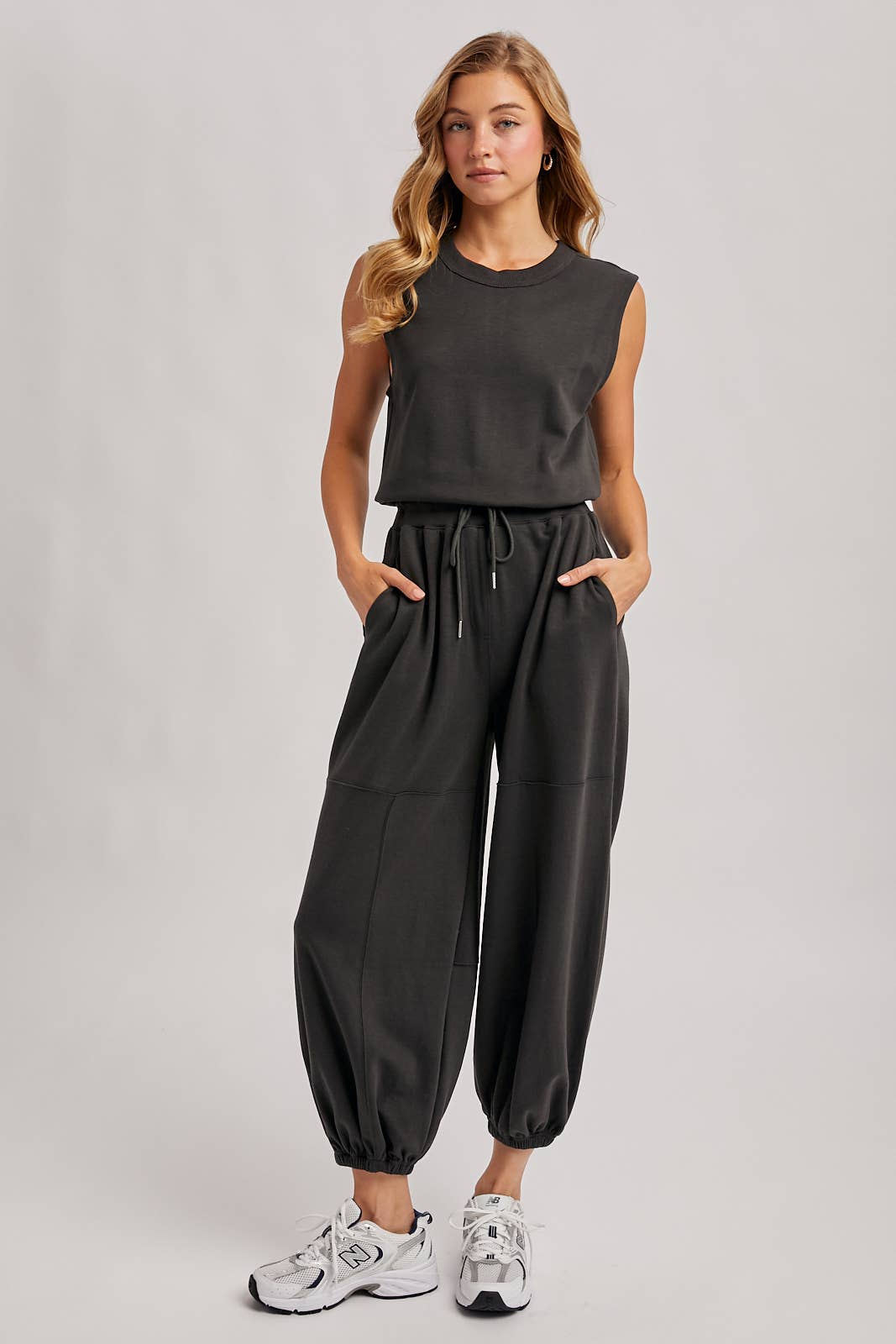 DRAWSTRING WAIST SLEEVELESS KNIT ACTIVE JUMPSUIT: ASH