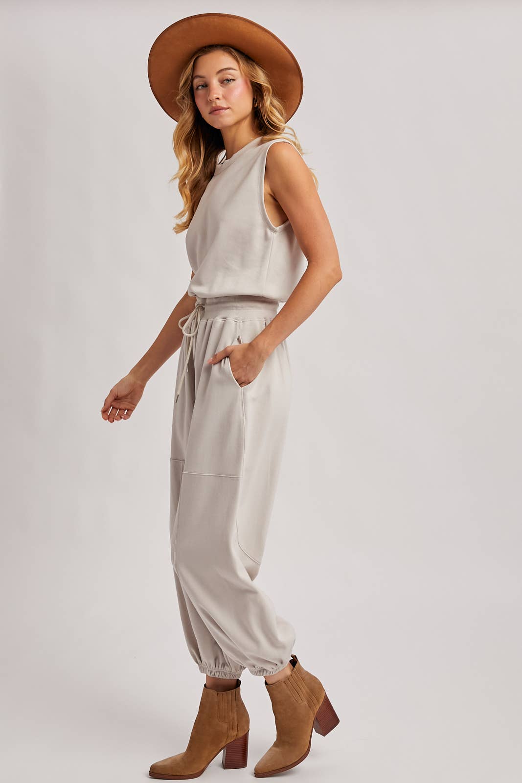 DRAWSTRING WAIST SLEEVELESS KNIT ACTIVE JUMPSUIT: ASH
