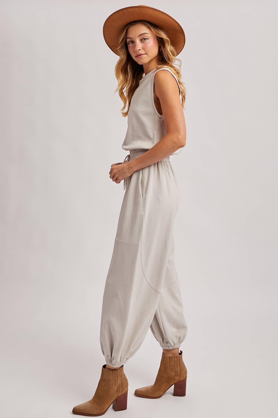 DRAWSTRING WAIST SLEEVELESS KNIT ACTIVE JUMPSUIT: ASH