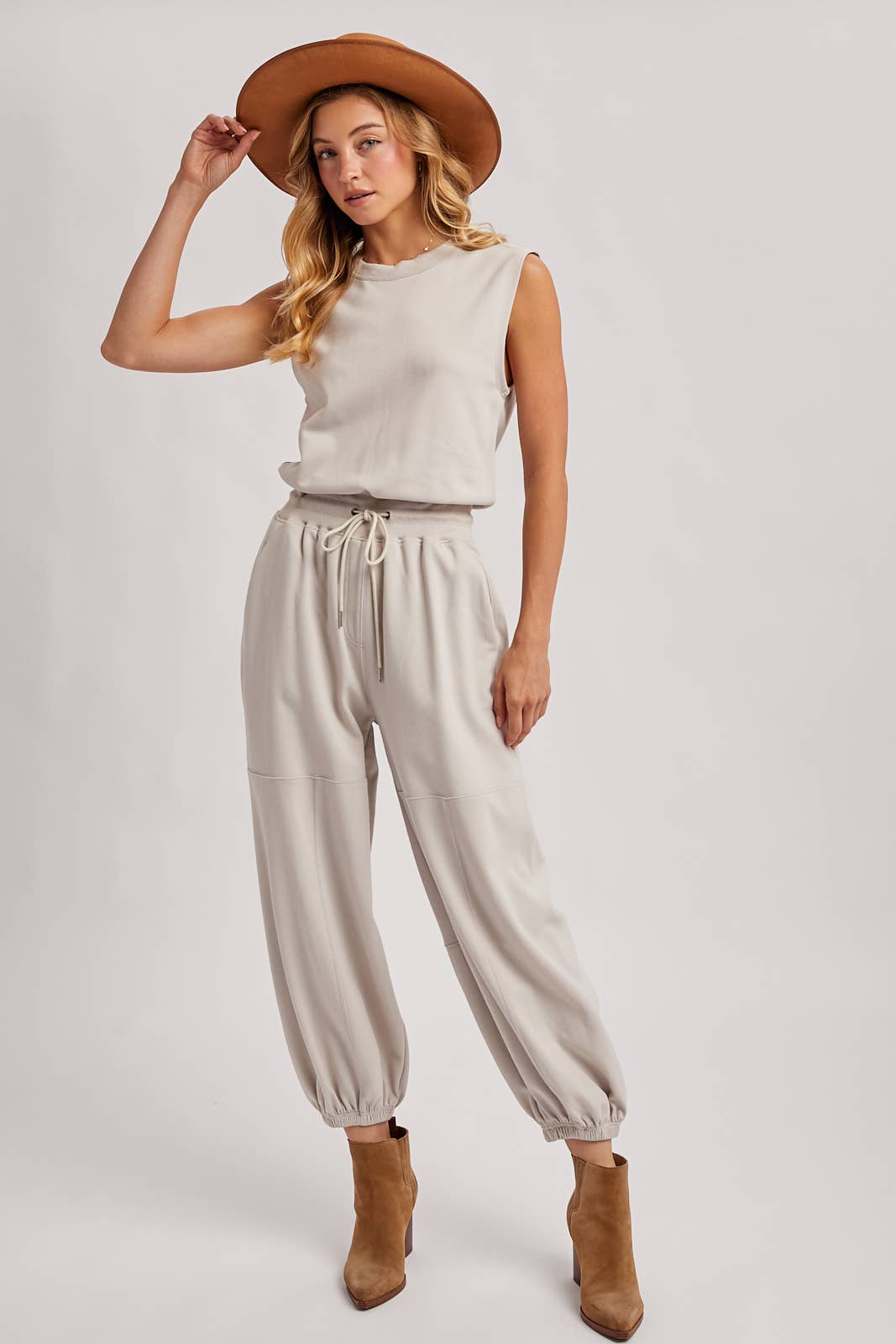 DRAWSTRING WAIST SLEEVELESS KNIT ACTIVE JUMPSUIT: ASH