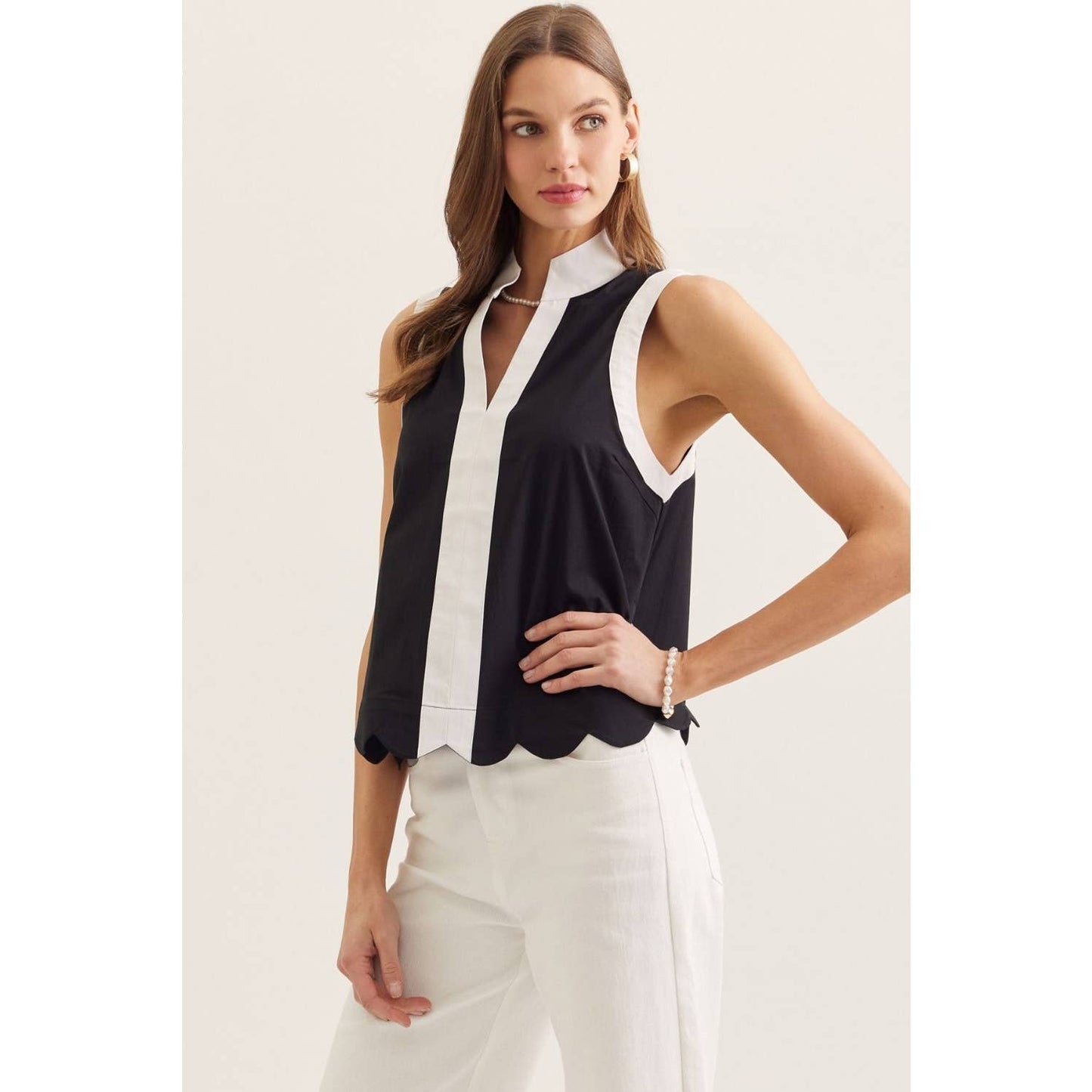 Solid sleeveless top: BLACK