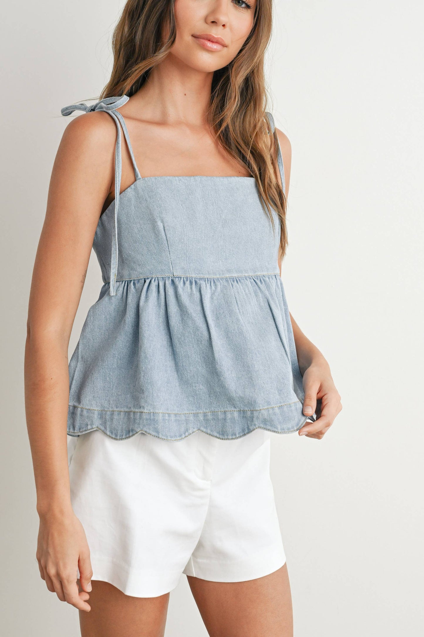 Denim Tie-Strap Peplum Top: LIGHT BLUE