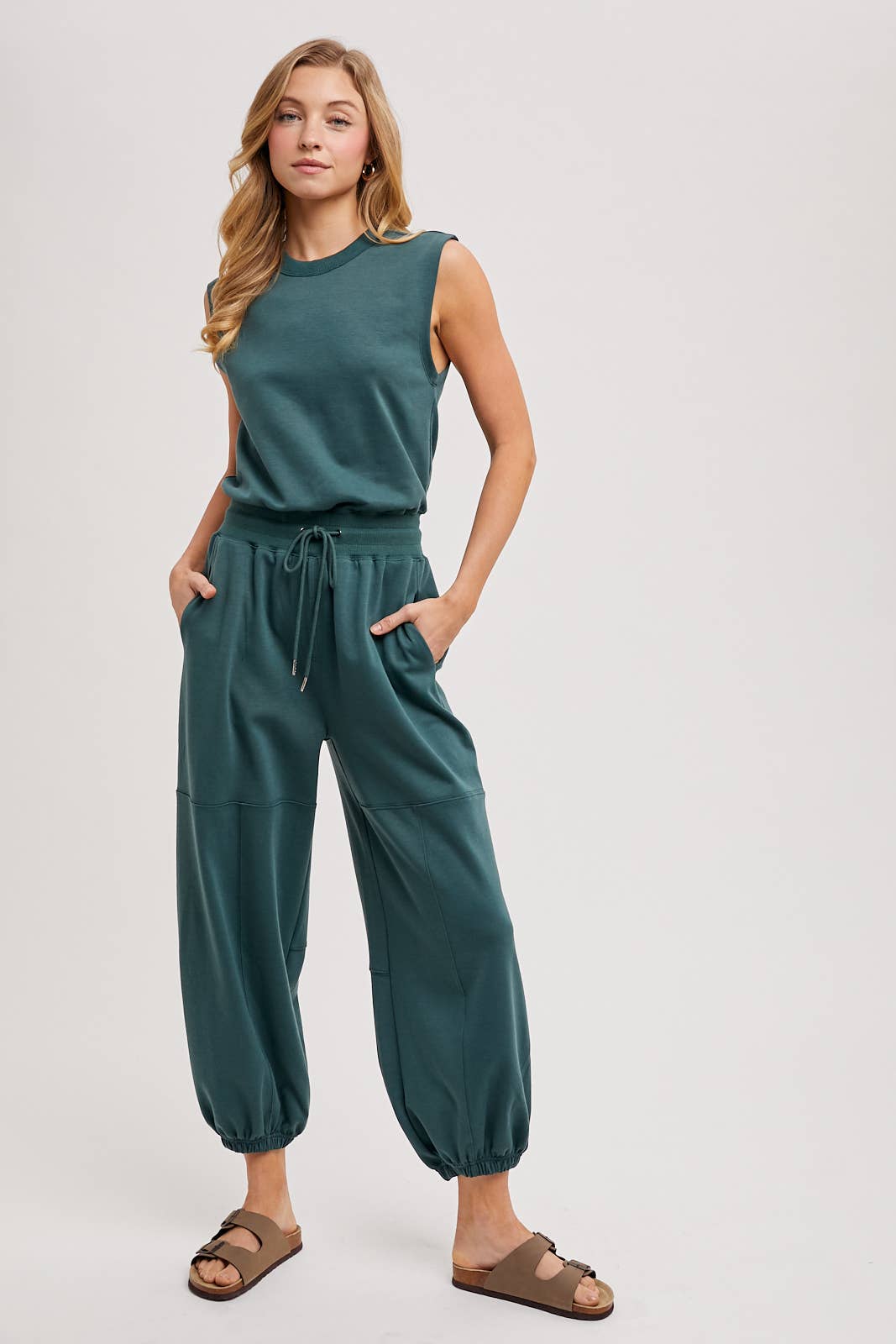 DRAWSTRING WAIST SLEEVELESS KNIT ACTIVE JUMPSUIT: ASH