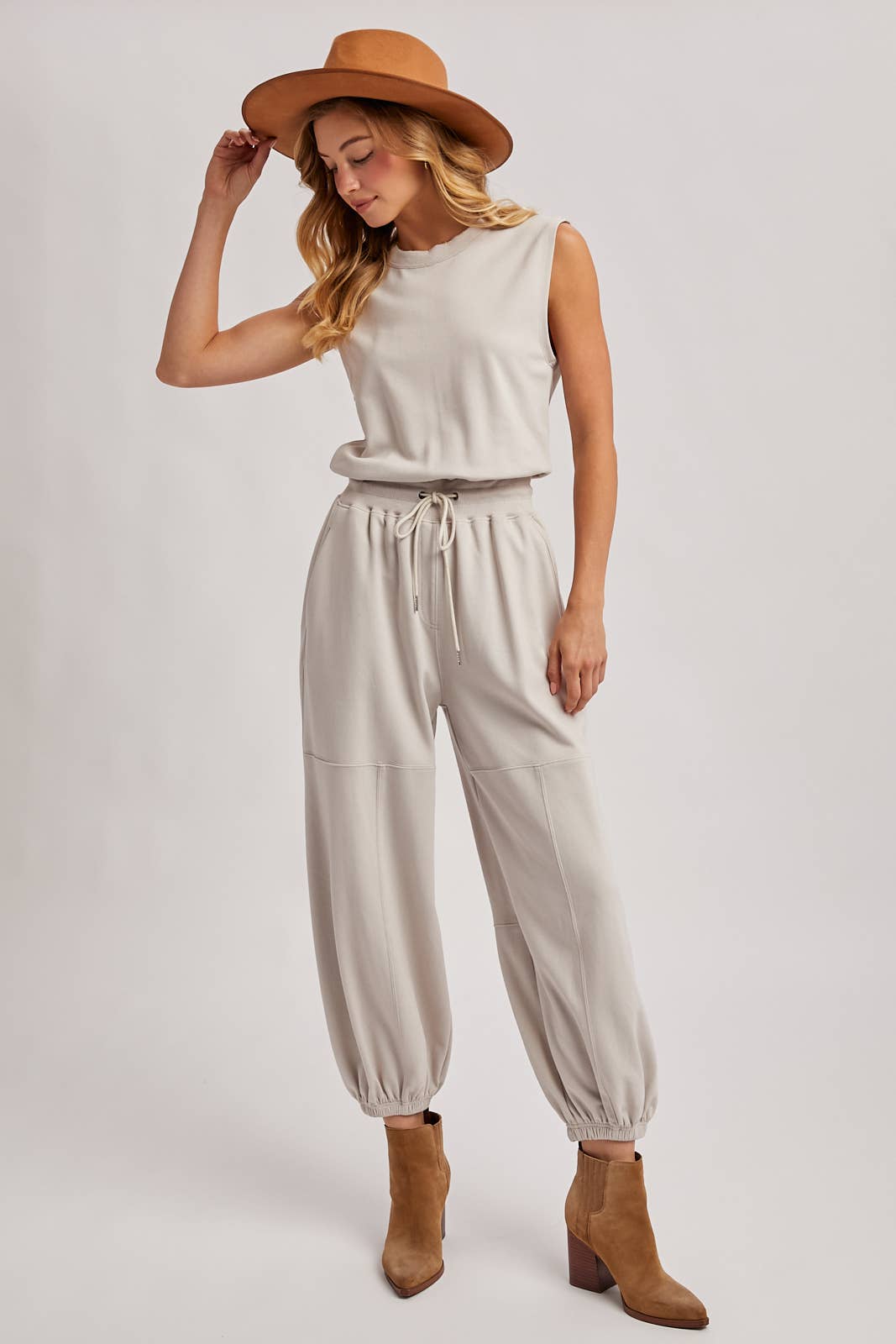 DRAWSTRING WAIST SLEEVELESS KNIT ACTIVE JUMPSUIT: ASH