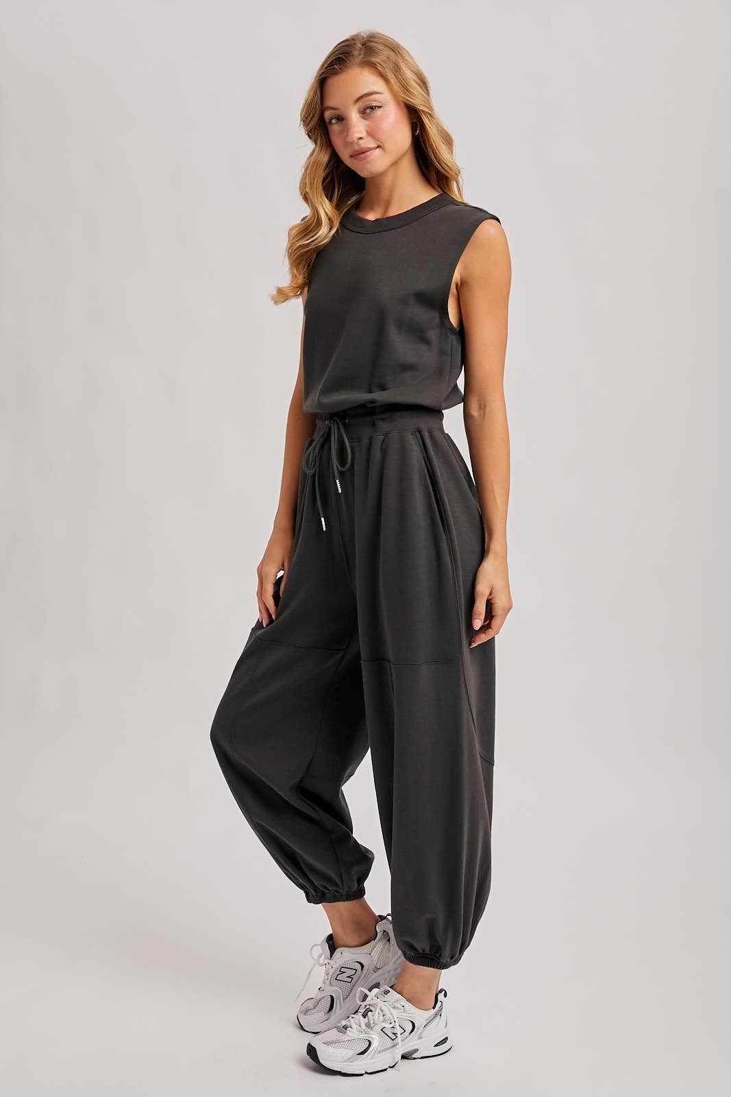 DRAWSTRING WAIST SLEEVELESS KNIT ACTIVE JUMPSUIT: ASH