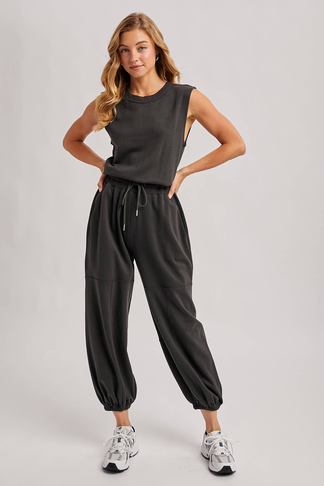 DRAWSTRING WAIST SLEEVELESS KNIT ACTIVE JUMPSUIT: ASH