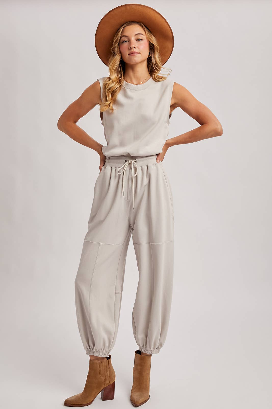 DRAWSTRING WAIST SLEEVELESS KNIT ACTIVE JUMPSUIT: ASH