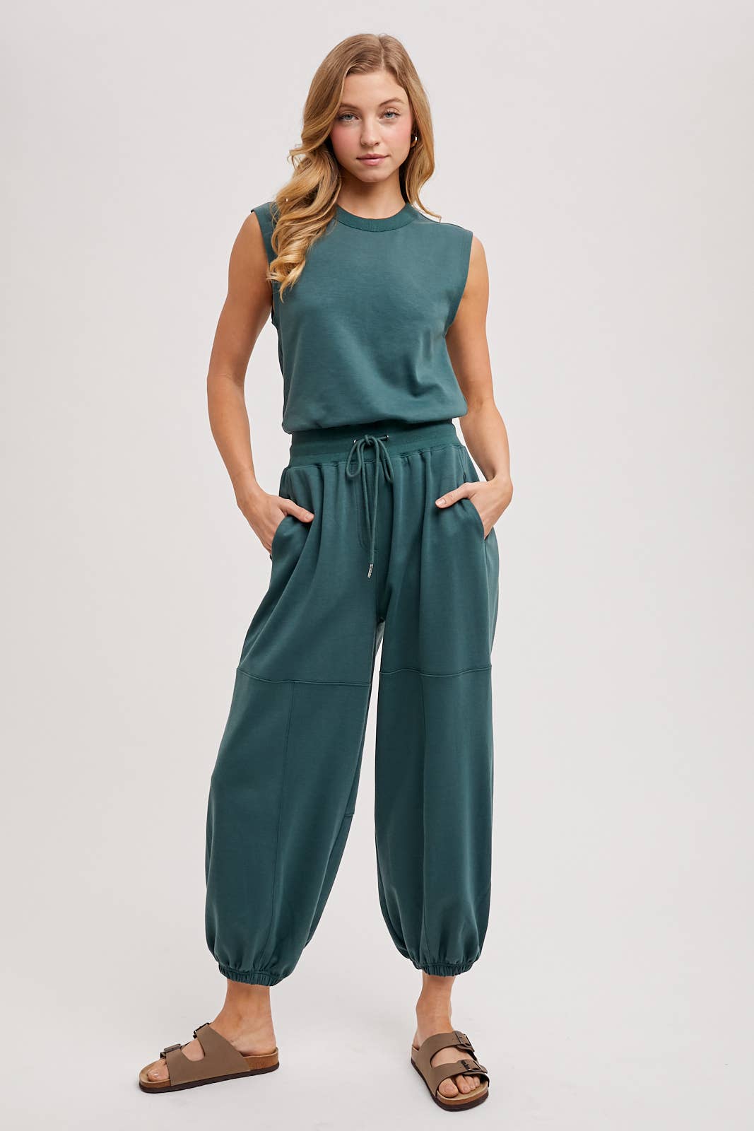 DRAWSTRING WAIST SLEEVELESS KNIT ACTIVE JUMPSUIT: ASH