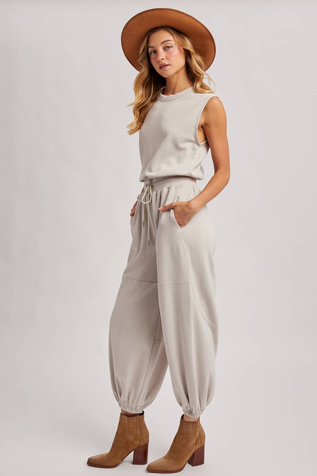 DRAWSTRING WAIST SLEEVELESS KNIT ACTIVE JUMPSUIT: ASH
