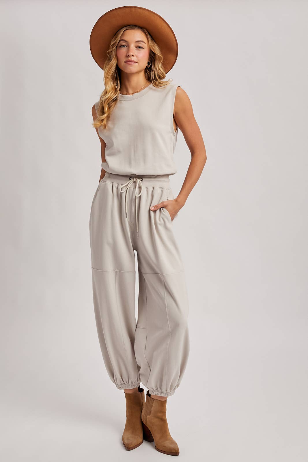 DRAWSTRING WAIST SLEEVELESS KNIT ACTIVE JUMPSUIT: ASH