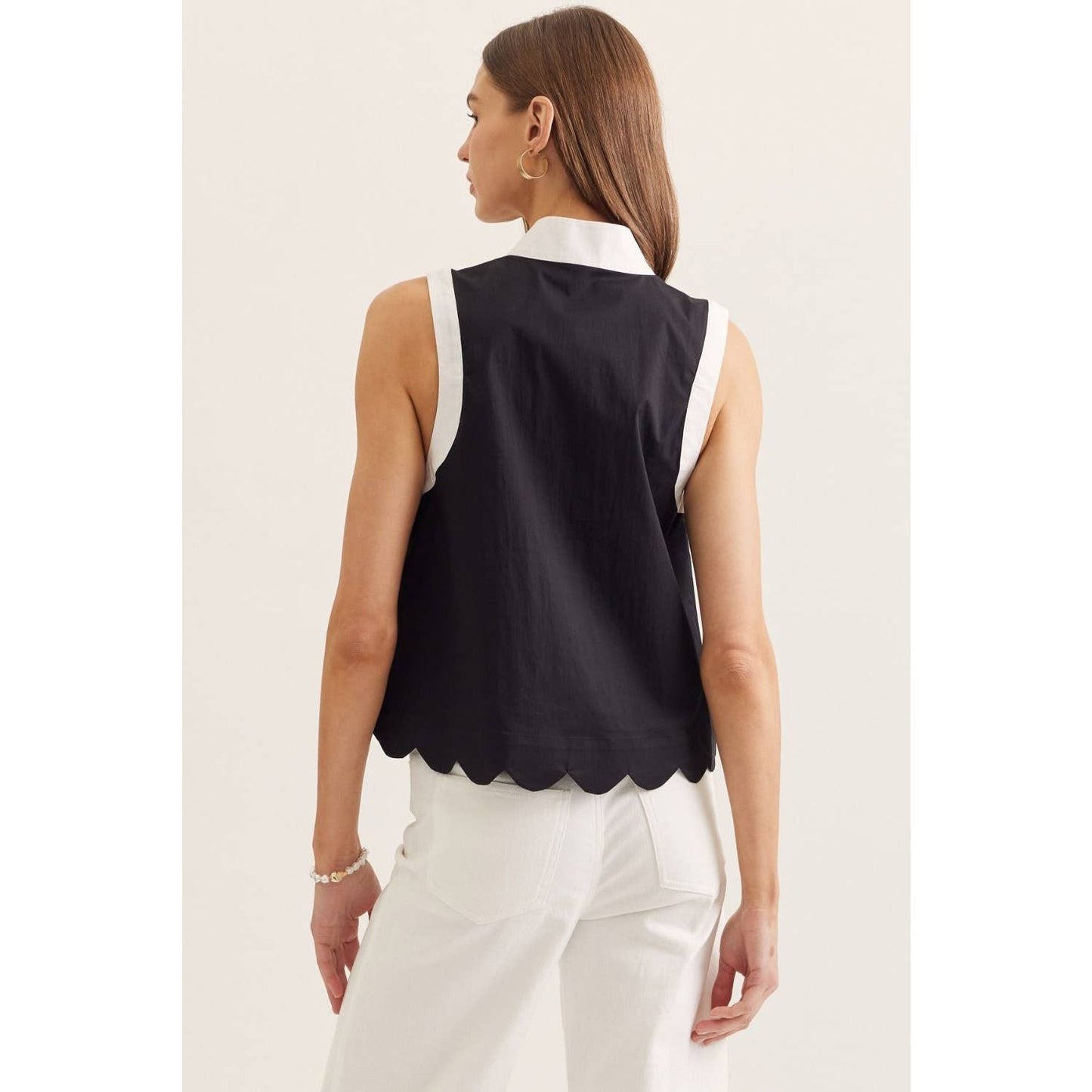 Solid sleeveless top: BLACK
