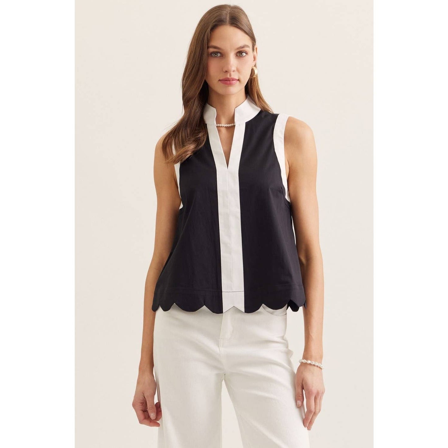 Solid sleeveless top: BLACK