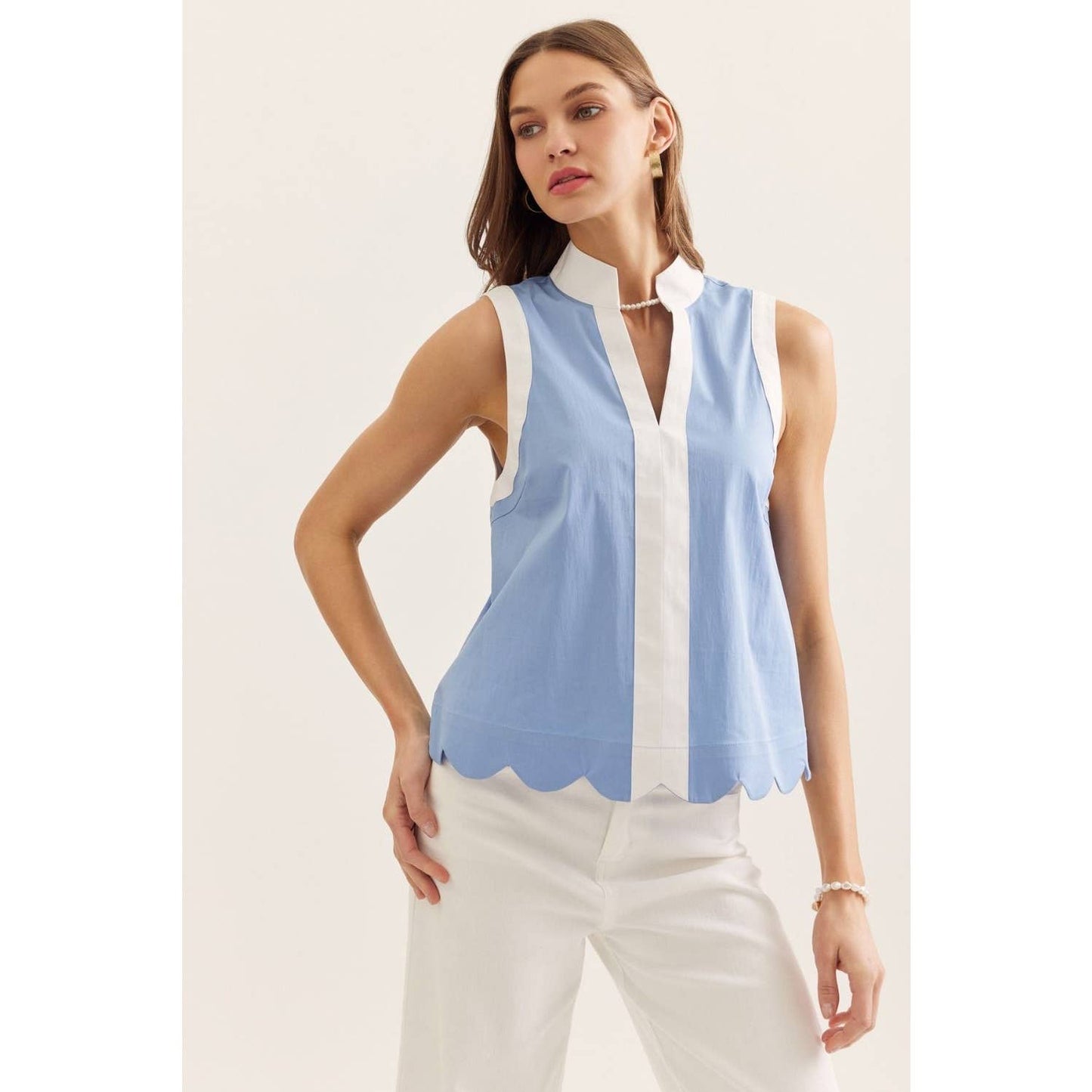 Solid sleeveless top: BLACK