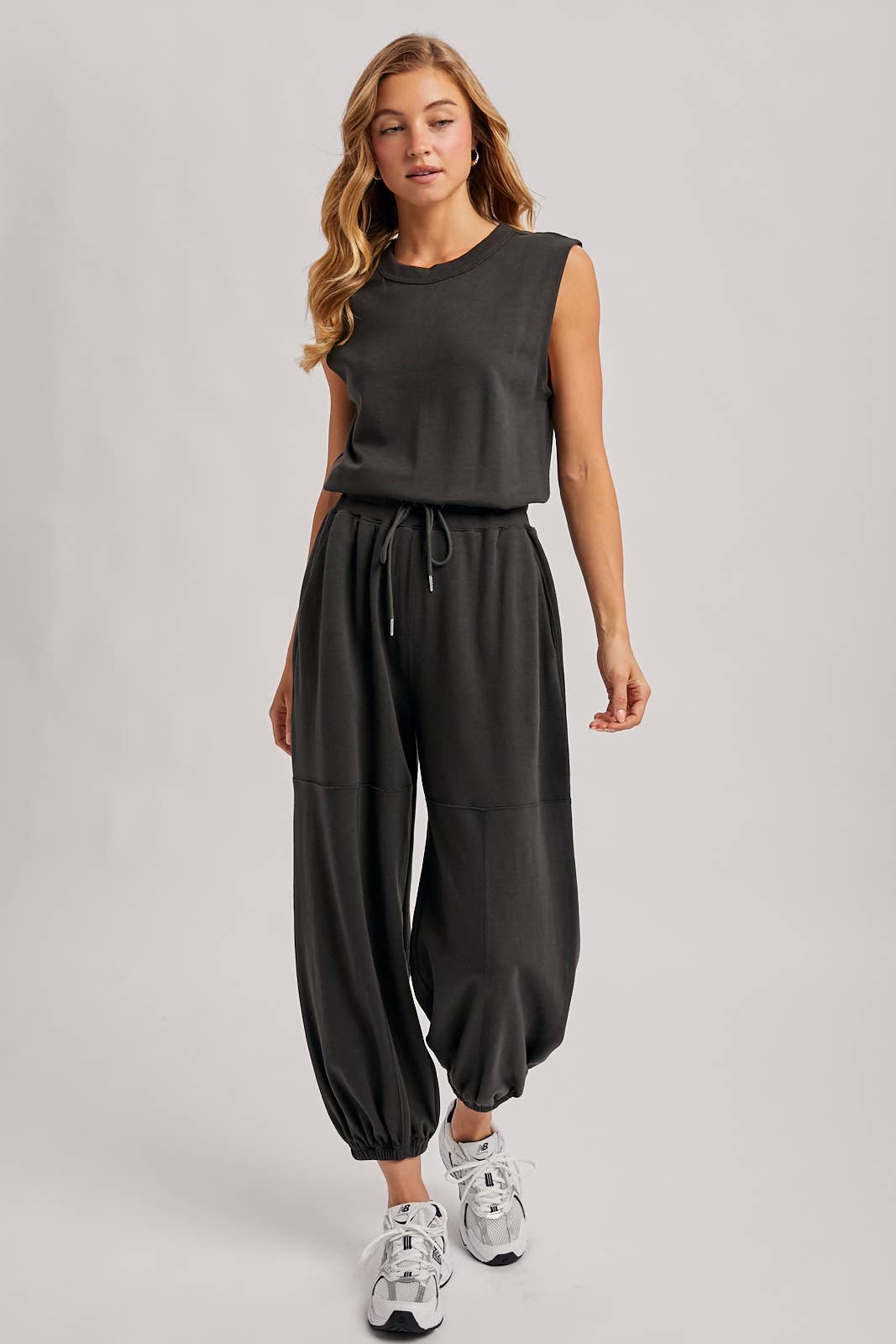 DRAWSTRING WAIST SLEEVELESS KNIT ACTIVE JUMPSUIT: ASH