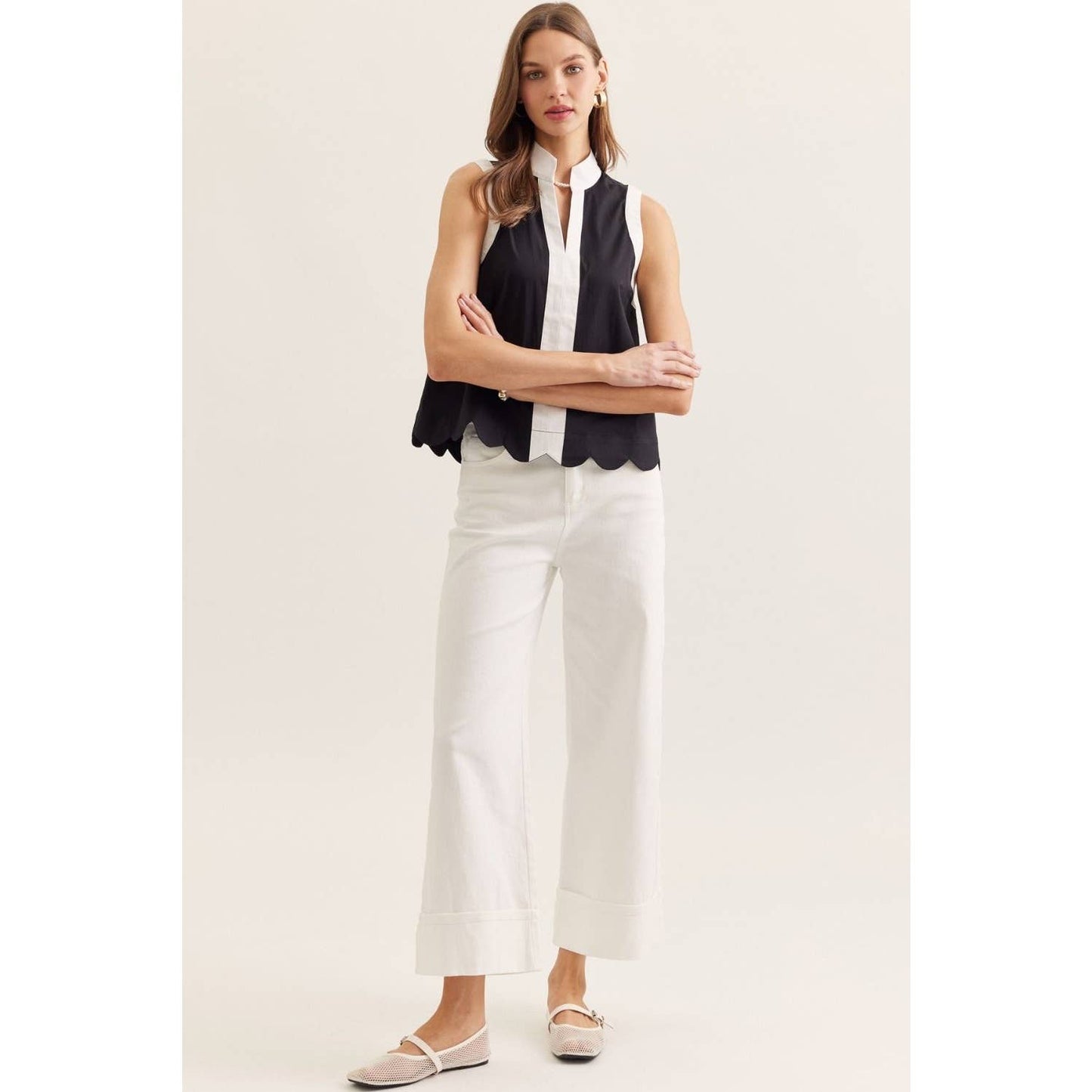 Solid sleeveless top: BLACK