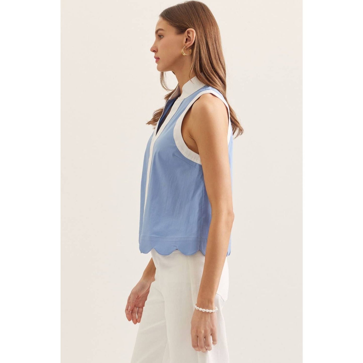 Solid sleeveless top: BLACK